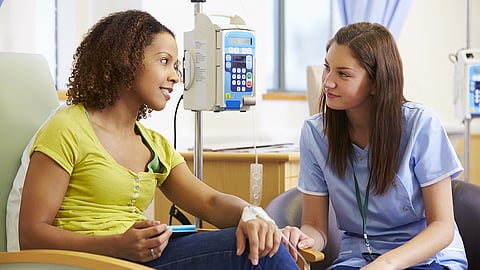 black woman receiving chemotherapy