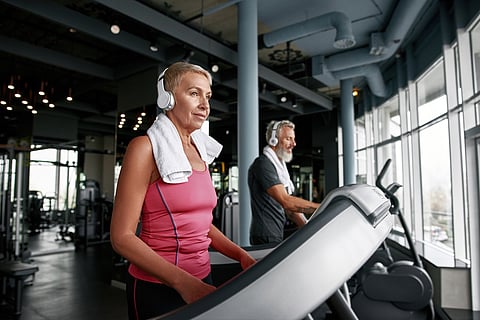 couple on treadmill exercise