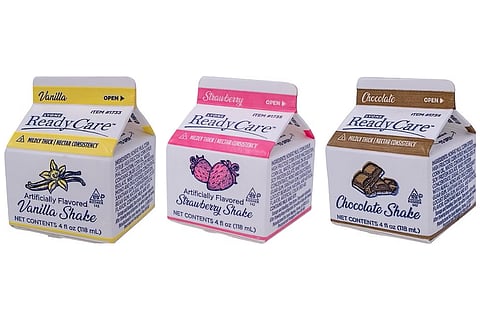 Photo of some of the frozen supplemental shakes under brands Lyons ReadyCare and Sysco Imperial