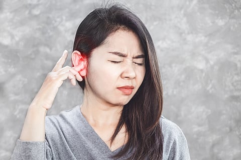 Women suffering from tinnitus, ringing in the ears