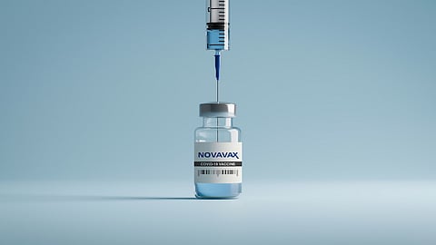 Novavax vaccine vial with a needle in it