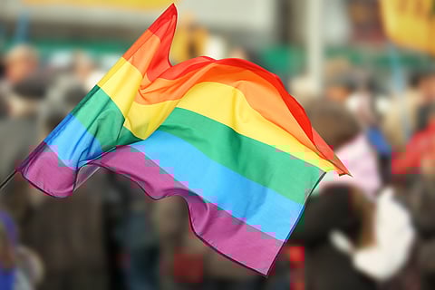 Rainbow flag waving outdoors/LGBTQ