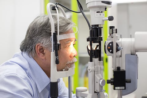 older man having eye exam