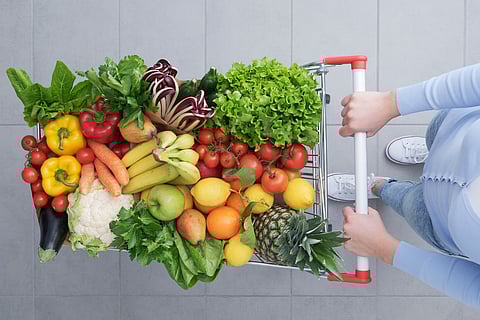Fruits and vegetables in grocery cart