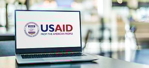 Laptop displaying logo of USAID