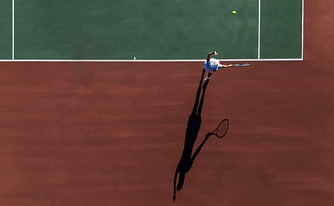Woman playing tennis