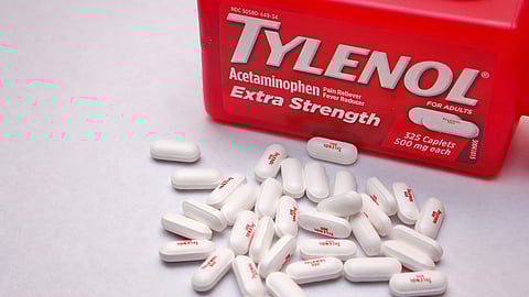 Bottle Of Tylenol Extra Strength With Many Pills On A Wooden Table Which Was Sold Out During Covid-19 time, headache, Painkillers