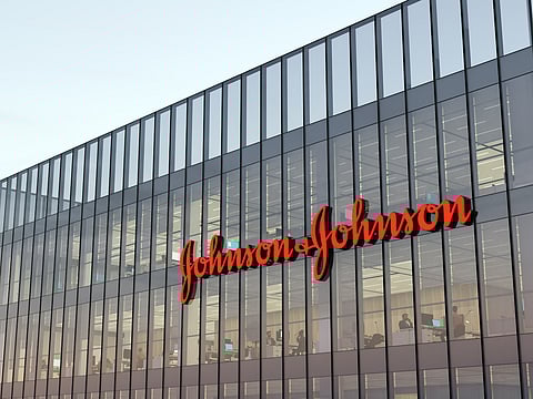 Johnson & Johnson Signage Logo on Top of Glass Building