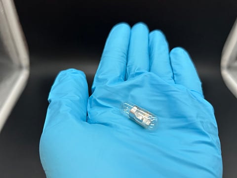 A capsule that can report when you've swallowed it, by unfurling a tiny radio antenna and sending out a signal from your stomach.