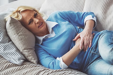 Middle-aged woman with stomach pain, Crohn's disease