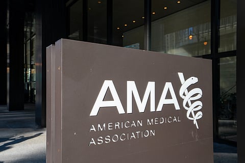 The sign of American Medical Association (AMA), the largest professional association for physicians in the U.S., is seen at its headquarters in Chicago, Illinois.