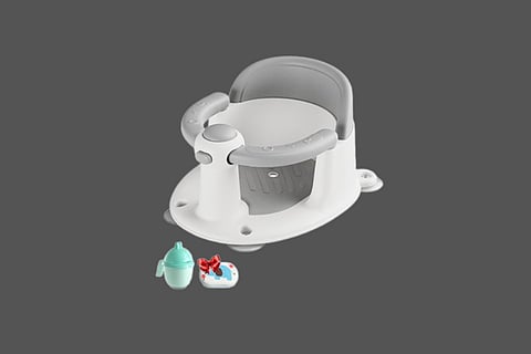 A photo of the recalled baby bath seat from Trankerloop against a dark grey backdrop