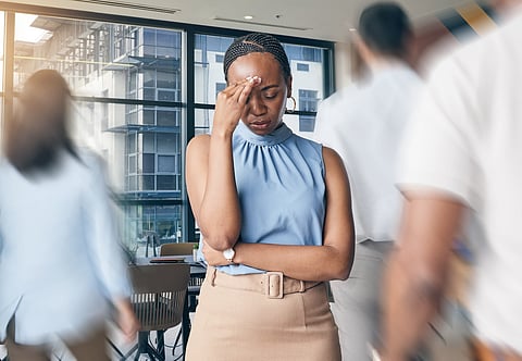 Woman suffering chronic stress at work