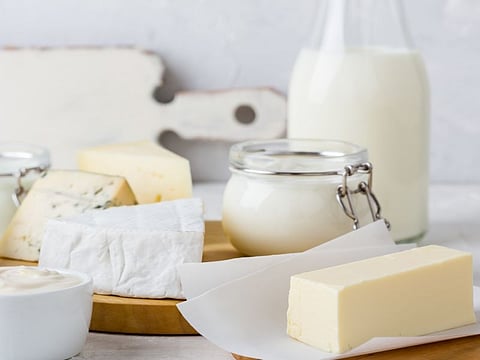 Fresh organic dairy products on white table