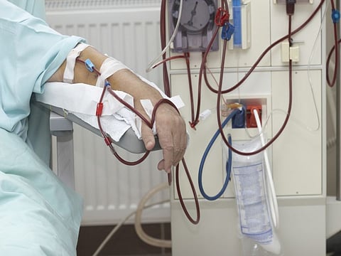 patient helped during dialysis session in hospital