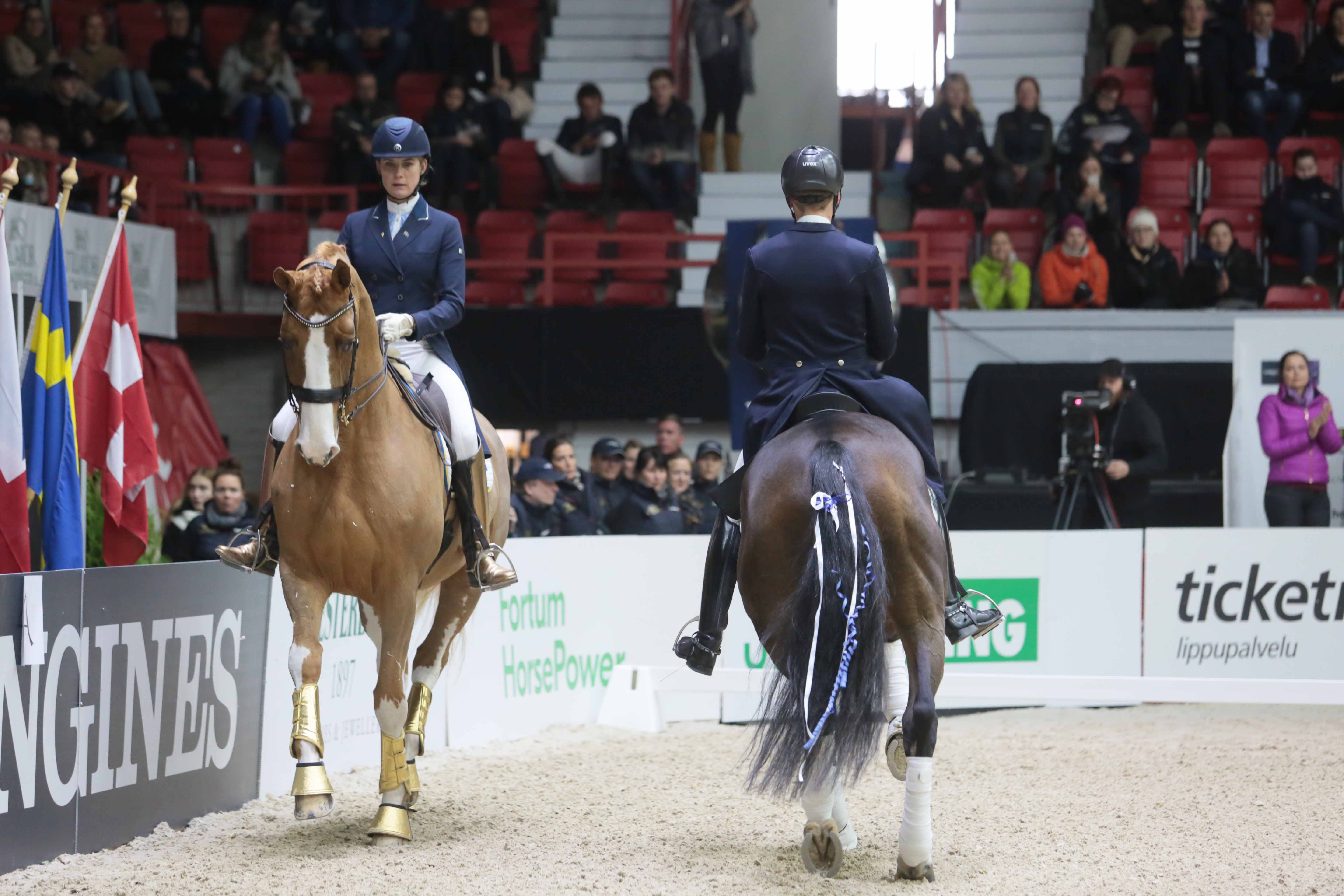 Emilie Brolin ja Henri Ruoste kaksintaistelun tiimellyksessä.
