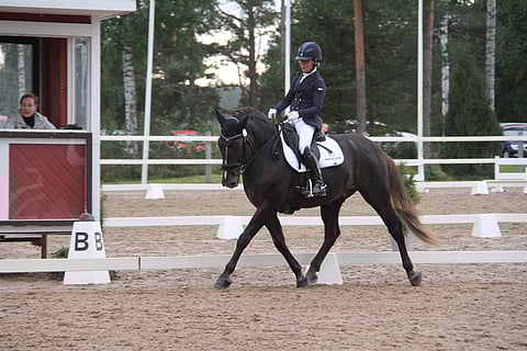 Anna Kärkkäinen ja Kulta-ahon Kasimir.