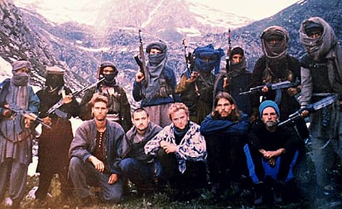 The hostages: seated left to right, Keith Mangan (UK), Dirk Hasert (Germany), Hans Christian Ostroe (Norway), Paul Wells (UK) and Donald Hutchings (USA), in a picture released by the Kashmiri militants.