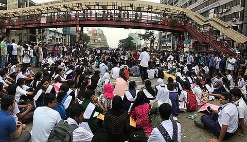 Students organise a sit-in to block roads. Photo: Wikimedia