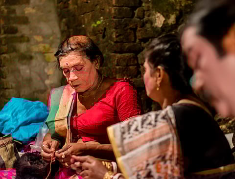 A Lavani artist getting ready for their performance. Lavani performers are appropriated as totems for Marathi cultural identity and simultaneously considered taboo. They are often denied economic opportunities and social acceptance even as their art is consumed by the elite.