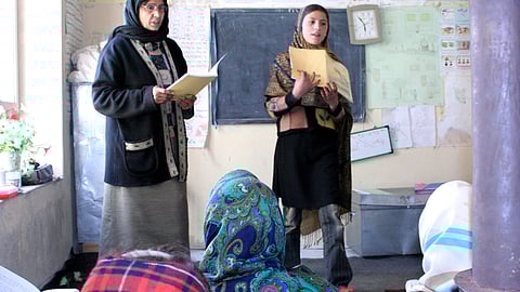 Afghan women participate in an accelerated learning class before the Taliban takeover in 2021