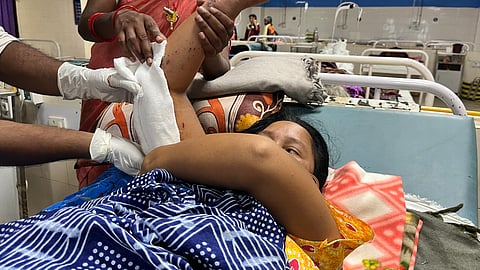 Adivasi woman, at a government hospital in Chhattisgarh after she stepped on an IED planted due to India anti-Naxalite or Maoist drive