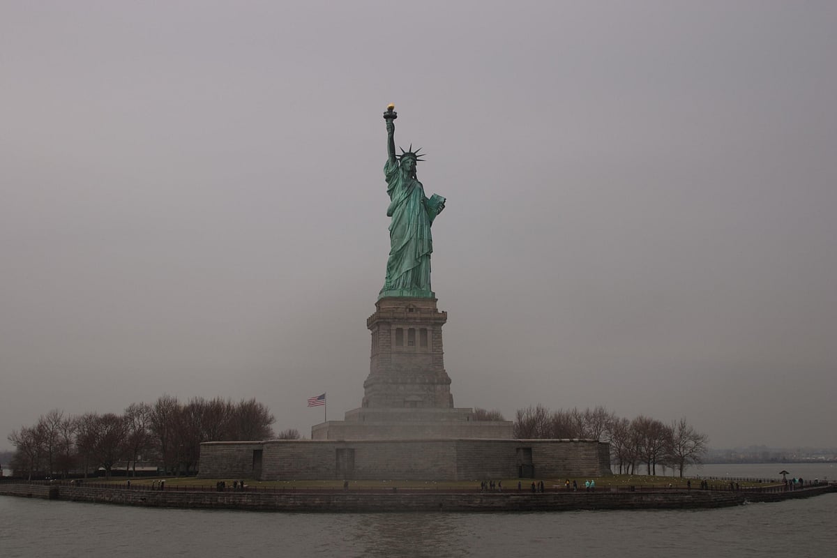 The Statue of Liberty on a dark, cloudy day