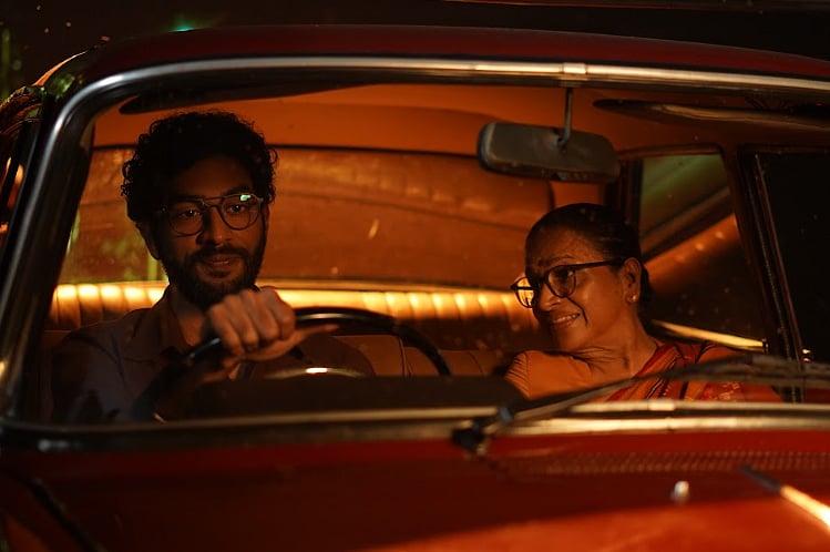 A still from the film 'Rani' showing the character of Richard de Zoysa driving a car with his mother, Manorani Saravanamuttu,