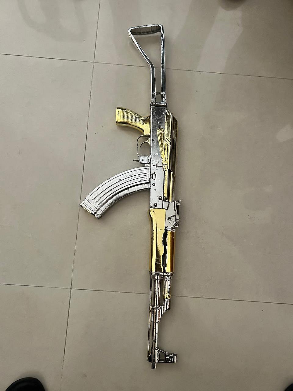 Close-up of a gold-plated gun. A 68-year-old woman was arrested in Sri Lanka carrying this weapon into an apartment complex in Colombo.