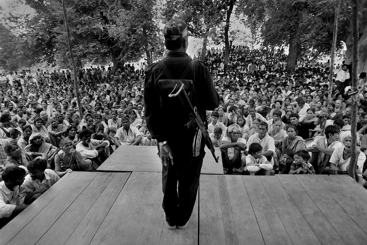 A member of the Naxalite movement making a speech to a group of supporters.