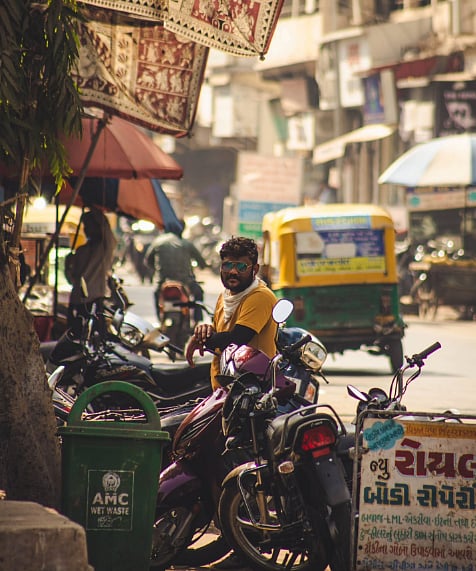 A man on a bike in Ahmedabad, India
