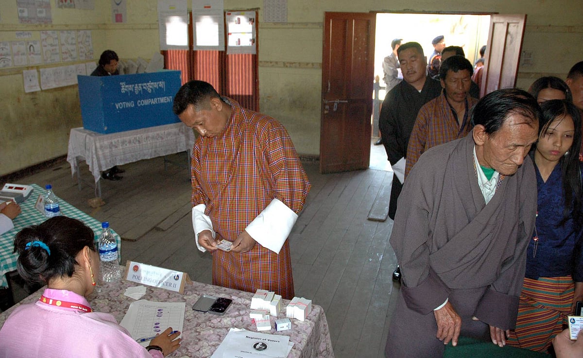 Bhutanese practice casting their votes at a polling station - a voting exercise for residents in preparation for the first pa