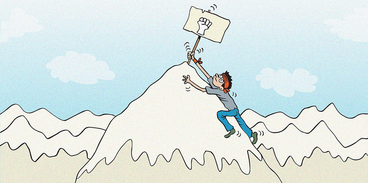 Photo of young man climbing a mountain holding a placard and planting it on the peak - representing Nepal's Gen Z protests in October 2025