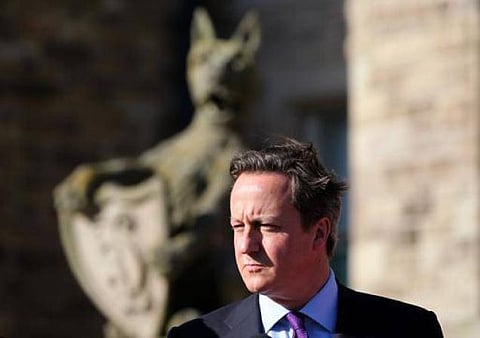 கேமரூன் இந்தியா வருவதை ஒட்டி புதிய விசா முறையைக் கைவிட்டது பிரிட்டன்