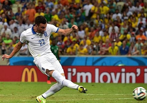 நாக் அவுட் சுற்றுக்கு முதன்முறையாக தகுதி பெற்ற கிரீஸ்; ஐவரி கோஸ்ட்  வெளியேறியது