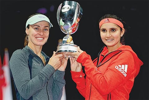 டபிள்யூடிஏ பைனல்ஸ்﻿: சானியா - ஹிங்கிஸ் ஜோடி சாம்பியன்﻿