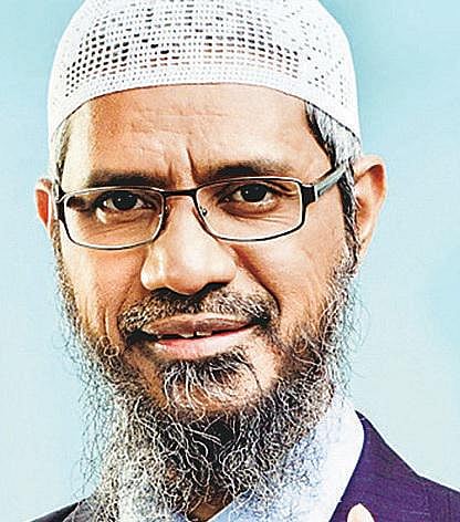 சர்ச்சைக்குரிய மத போதகர் ஜாகிர் நாயக்கின்﻿ என்ஜிஓ அமைப்புக்கு உரிமம் புதுப்பித்த உள்துறை அதிகாரிகள் 4 பேர் சஸ்பெண்ட்﻿