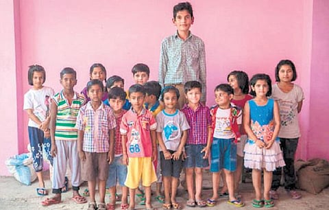 8 வயது சிறுவனின் உயரம் 6 அடி 6 அங்குலம்: ‘உலகிலேயே மிக உயரமானவர்’ என்ற சாதனை படைத்தார்