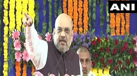 சில்வாசாவில் நடந்த கூட்டத்தில் பாஜக தேசியத் தலைவரும், உள்துறைஅமைச்சருமான அமித் ஷா பேசிய காட்சி : படம் ஏஎன்ஐ