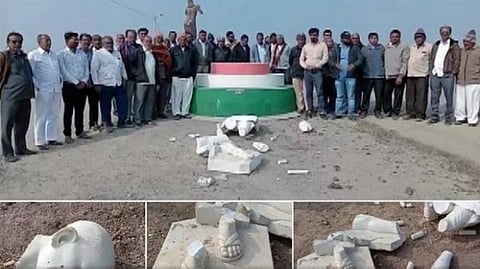 குஜராத் மாநிலம் அம்ரேலி ஏரிக்கரையில் அடையாளம் தெரியாத சிலரால் காந்தி சிலை உடைக்கப்பட்டுள்ள காட்சி.