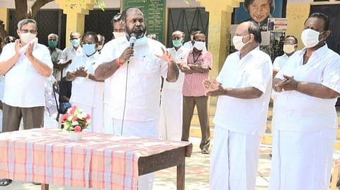 பூத் கமிட்டி கூட்டத்தில் அமைச்சர் ஆர்பி. உதயகுமார் பேசினார். அருகில் நிர்வாகிகள் உள்ளனர்.