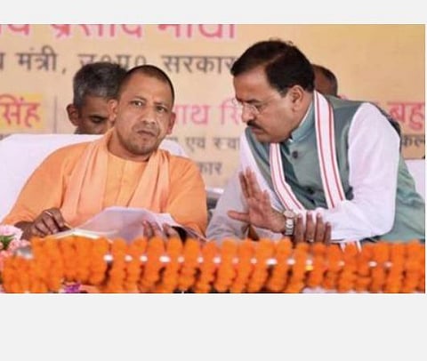 உ.பி.முதல்வர் ஆதித்யநாத், துணை முதல்வர் கேசவ் பிரசாத் மவுரியா.