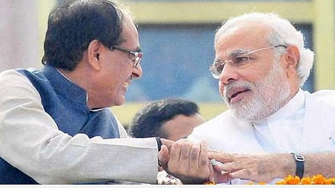 மத்தியப் பிரதேச முதல்வர் சிவராஜ் சிங் சவுகான், பிரதமர் மோடி: கோப்புப் படம்.