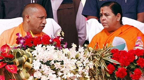 உ.பி. முதல்வர் யோகி ஆதித்யநாத், பாஜக மூத்த தலைவர் உமா பாரதி : கோப்புப்படம்