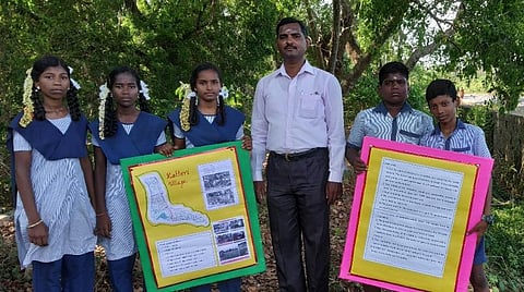 நீர் மேலாண்மை தொடர்பான ஆய்வில் ஈடுபட்ட குழந்தைகளுடன் ஆசிரியர் ராஜ்குமார்.