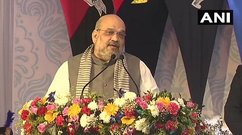 குவஹாட்டி நகரில் நடந்த நிகழ்ச்சியில் உள்துறை அமைச்சர் அமித் ஷா பேசிய காட்சி : படம்|ஏஎன்ஐ