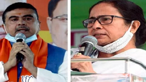 இடது சுவேந்து அதிகாரி, வலது மம்தா பானர்ஜி