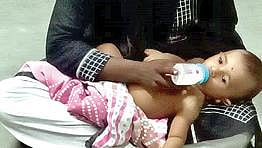 மீட்கப்பட்ட குழந்தை.