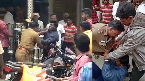 ஆலங்காயம் பஜார்பகுதியில் எஸ்எஸ்ஐ உமாபதியும், வாகன ஓட்டி மணிகண்டனும் சட்டையை பிடித்து நடுரோட்டில் சண்டையிட்ட காட்சி | படம் ந.சரவணன்.