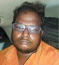 கைதான ராஜேஷ்.